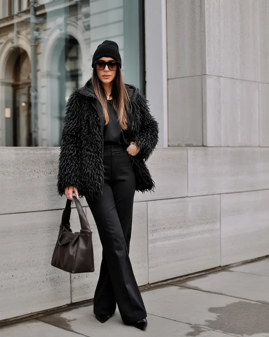 trendy-winter-outfits-for-women-over-40-Monochrome-Black-with-a-Statement-Texture