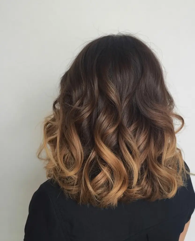 Brown Hair Color Ideas Winter 2025-2026 Caramel-Tipped Curls
