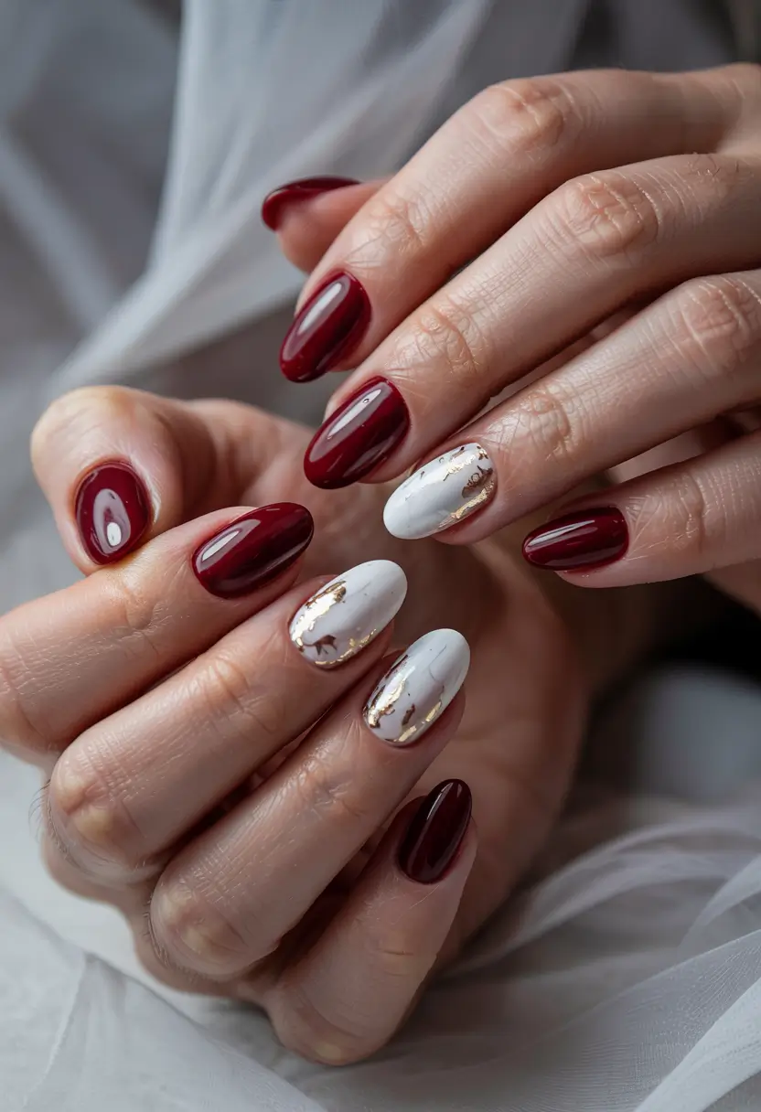 winter almond nails ideas 2025-2026 Cranberry Marble Red and White Luxe