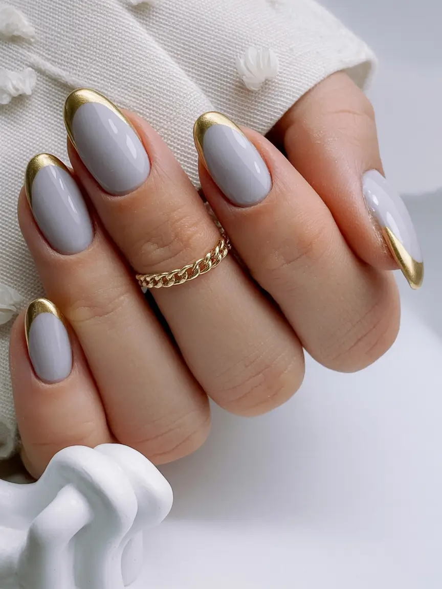 best french nails 2026 Metallic Gold Almond French With Dove Grey Base