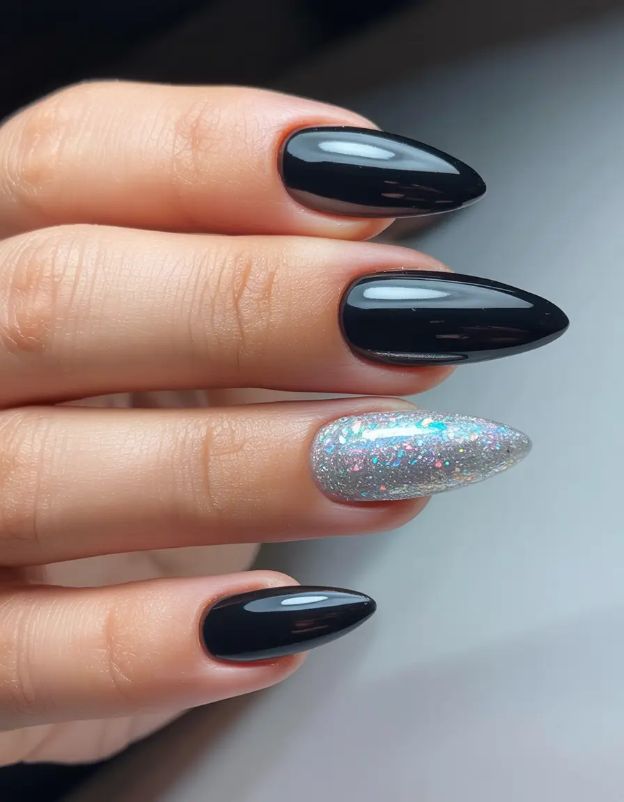 elegant black nails 2026 Black Gloss with an Opalescent Glitter Accent