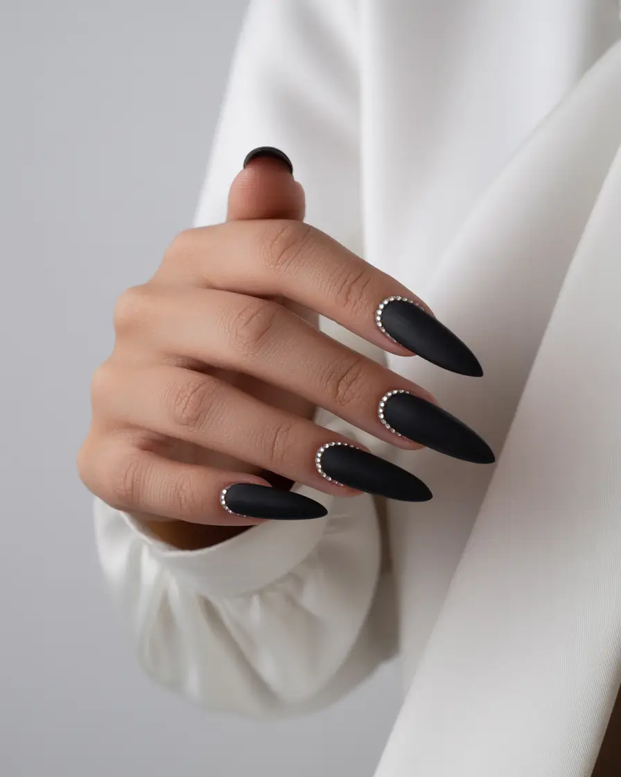 elegant black nails 2026 Matte Midnight Stilettos with Pearl Detailing