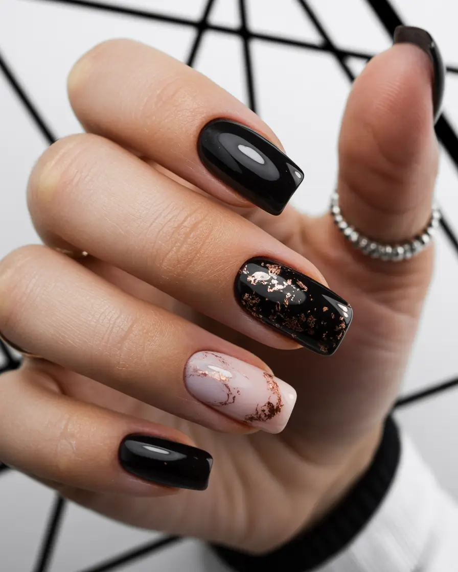 elegant black nails 2026 Black and Rose Gold Marble With High Gloss Finish
