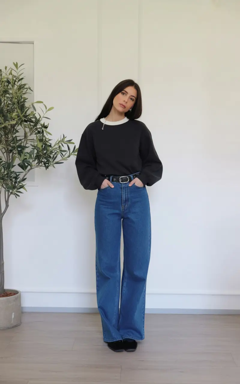 gorgeous spring jeans outfit 2026 Sleek Black Layers with True Blue Denim Confidence