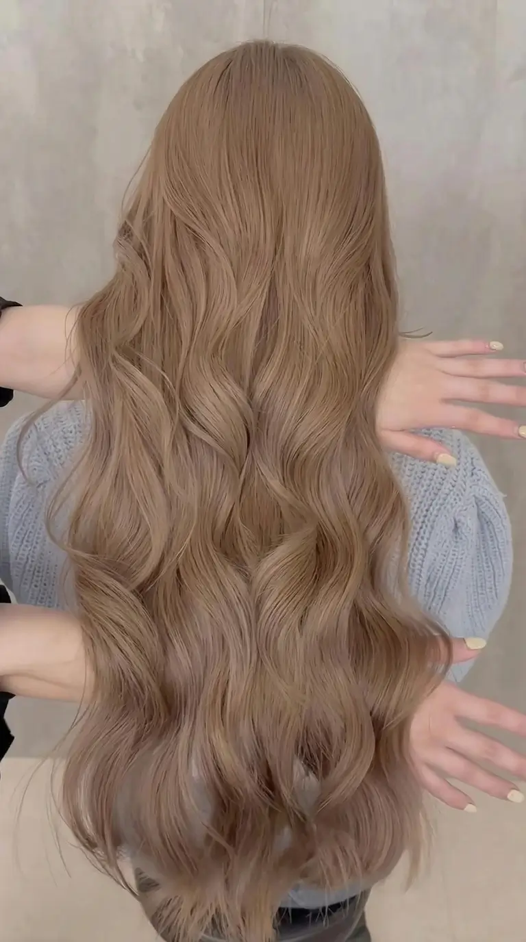 spring hair color trends 2026 Soft Caramel Stream Waves