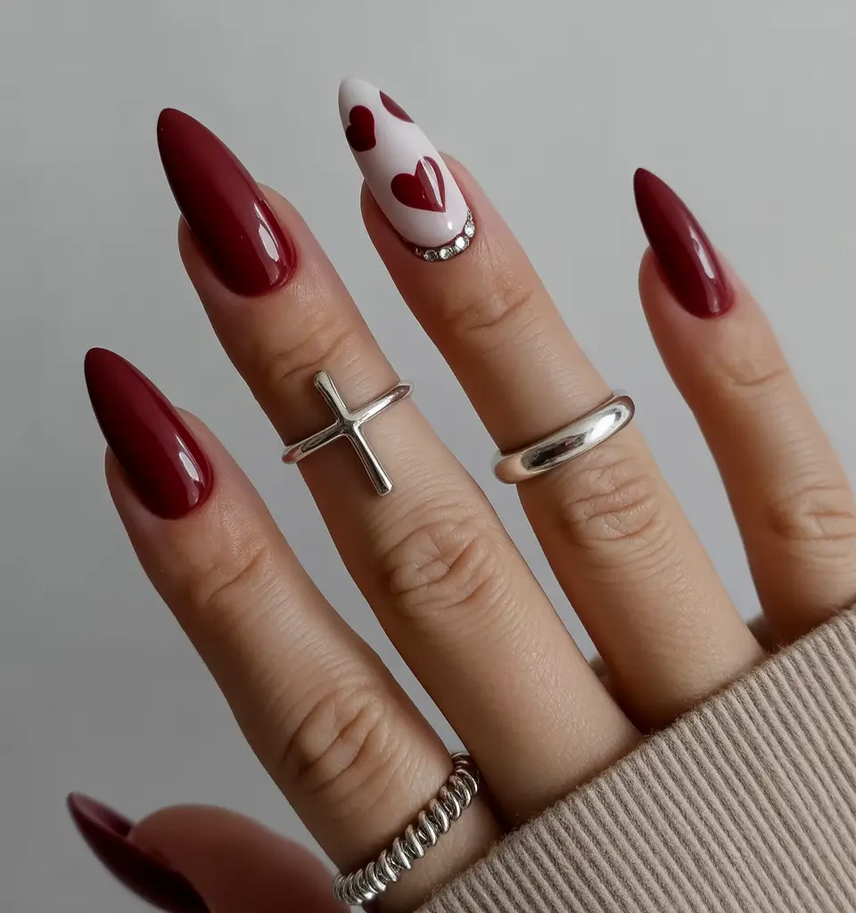 cute spring nails ideas 2026 Deep Cherry Almond Nails With Heart Accent Art