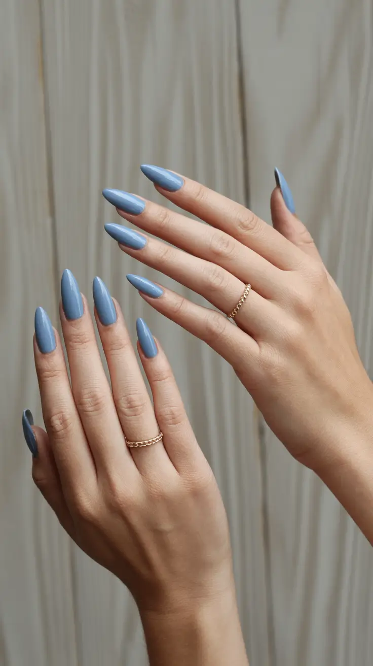 feminine classy spring nails 2026 Dusty Blue Acrylic Almond Statement