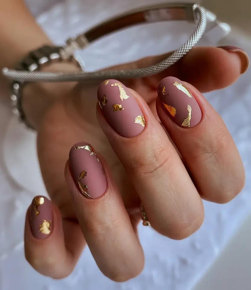 feminine classy spring nails 2026 Dusty Rose Short Nails With Gold Leaf Accent
