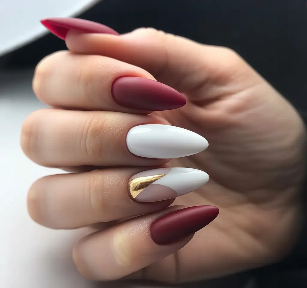 playful spring almond nails 2026 Matte Berry and White with Gold Accent