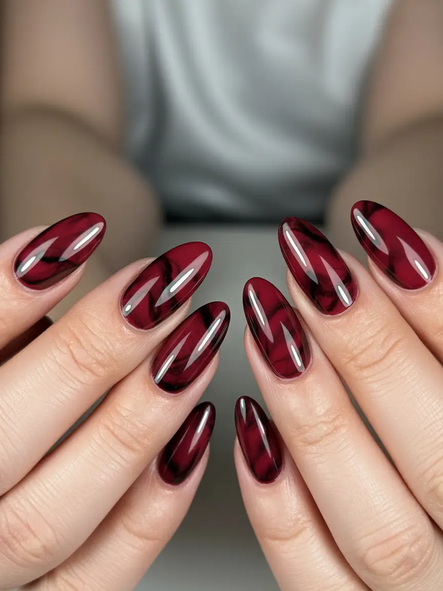 playful spring nail inspo 2026 Garnet Almond Glow Depth