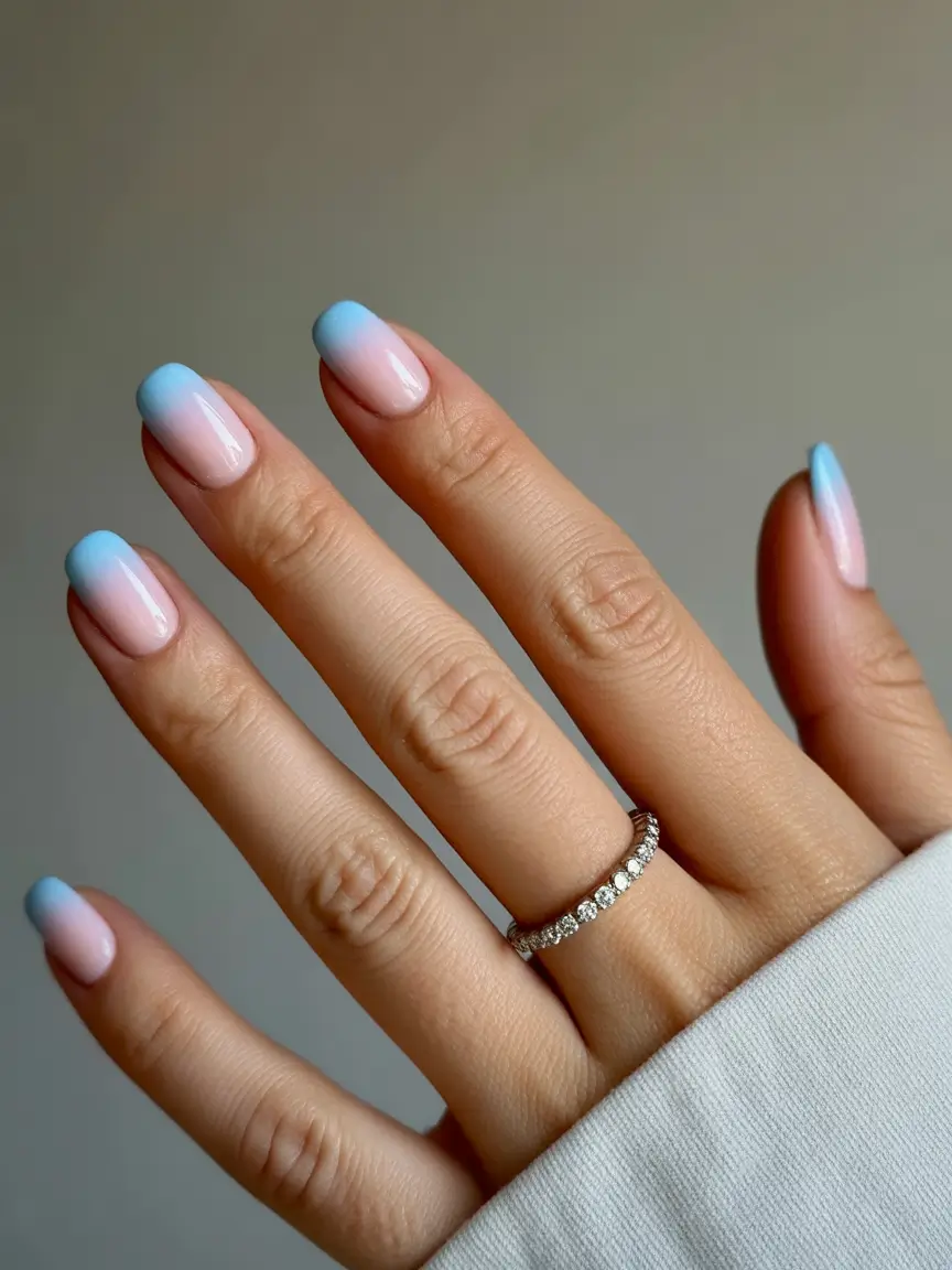 pretty fun spring nails 2026 Soft Blue Ombre for a Calm and Breezy Spring Feeling