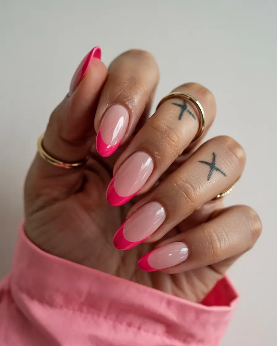 sophisticated trendy spring nails 2026 Hot Pink French Almond With Vibrant Spring Energy
