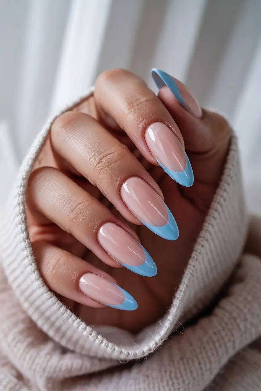 sophisticated trendy spring nails 2026 Sky Blue French Almond With Soft Spring Freshness