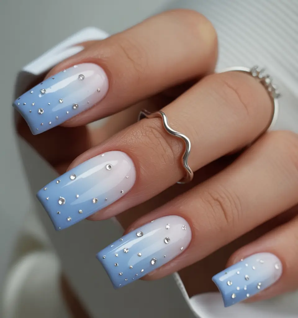 spring nail design 2026 Blue Crystal Ombre Sparkle